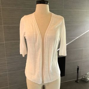 White, very light weight, sweater jacket. Small.